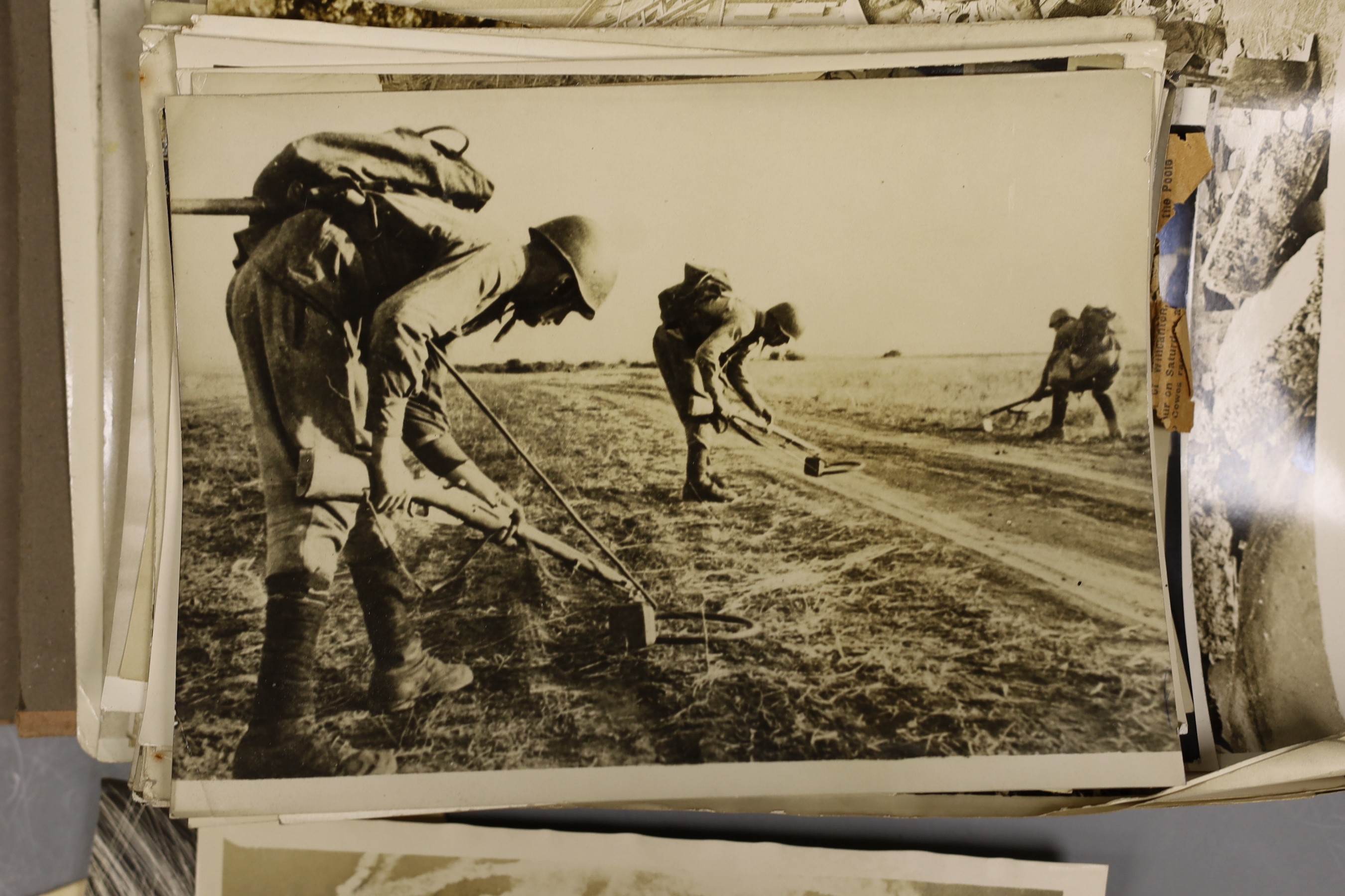A collection of mostly WWII related photos, in album